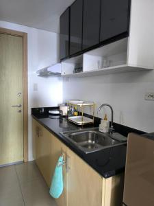 Urban Oasis at A & K Vibes City-View Condo