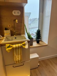 Apartmán Koperník - súkromné parkovacie miesto