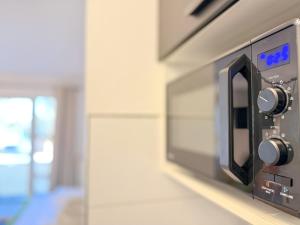 Apartment with balcony, good parking for long stay