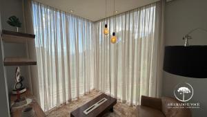 Casa com piscina 3 suítes a 15 min Centro Gramado