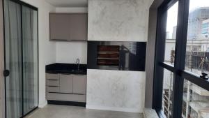 MEIA PRAIA Apartamento - Itapema