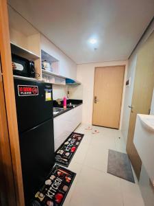 The Grass Residences 1 cozy bedroom with balcony netflix and wifi