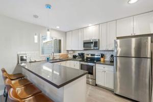 Chic 4BR Home with Hot Tub Fire Pit Arcade