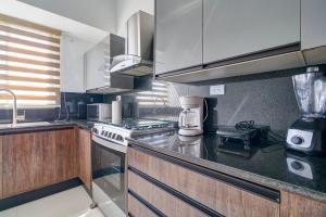 ® 2BR{Ajega~Views} @Downtown SDQ PoolGym