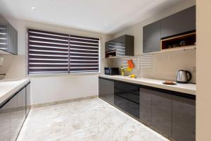 AKD Home 2 BHK Apartment with Pool Gym Candolim
