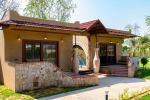 ELIVAAS Signature Tiger Cave Suite with Pvt and Shared Pool On Main Ranthambore Rd
