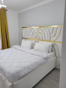 modern executive three bedroom apartment which features a swimming pool, state of the art fully equipped gym andmodern unmatched luxurious facilities which offfers luxury lifestyle