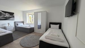 Moderne Maisonette-Wohnung mit Garten in Niestetal für 7 Personen