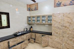 Aathi Homestay & Rooms