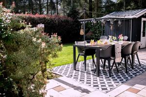 Natuurhuisje met omheinde tuin hond welkom stijlvol ingericht StayatSas Julia