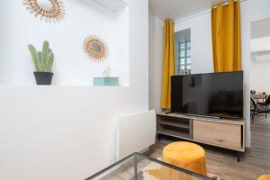 Confortable appartement 4 étoiles avec parking à seulement 150m des thermes de Bains-les-Bains