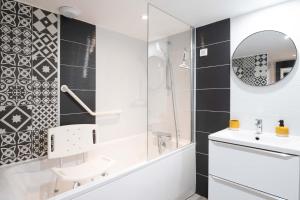 Confortable appartement 4 étoiles avec parking à seulement 150m des thermes de Bains-les-Bains