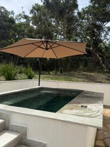 Casa Sol e Cachoeira