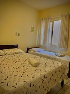 Apartamento a 50m da praia da Enseada - 3 quartos