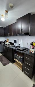 Cozy 1BR Cubao Condo Manhattan Parkview City View