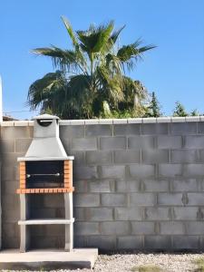 Alojamiento en el palmar cerca de la playa con jardin y barbacoa