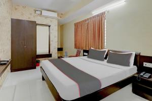 Capital O Champion Lotus Near Mantri Square Mall