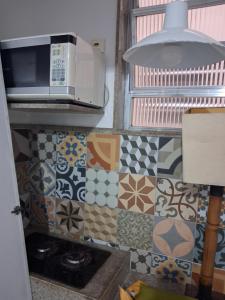 Quarto compartilhado de frente pra praia