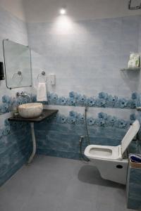 1BHK with AC, Balcony & Rooftop Jhula, Kitchen