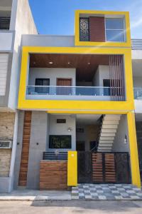 1BHK with AC, Balcony & Rooftop Jhula, Kitchen