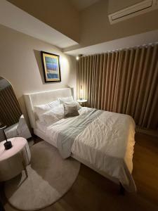 Cozy 1BR in BGC at Park Mckinley West Near Airport