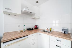 Łódź Downtown Comfort Studios by BookingHost