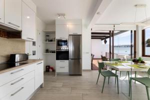 Sea Breeze Jarea by Escape Home