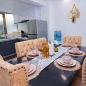 newly furnished two bedroom apartment with swimming pool, fully equipped gym, private parking space ,children playground and unbeatable scenic city views