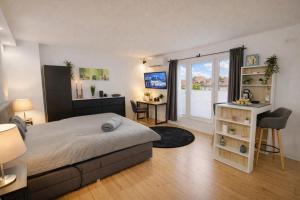Modernes Apartment für Geschäftsreisende und Paare - WLAN - Parkplatz - Nespresso - zentral
