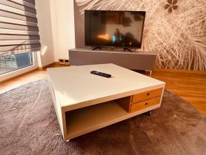 Senfzimmer mit Balkon