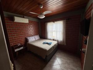 Casa com Piscina Próxima à Praia da Cachoeira