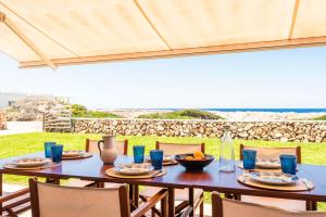 Charming beachfront villa with garden