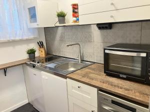 Gemütliche Ferienwohnung Ankerplatz mit eingezäuntem Garten