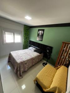 Stay in the Heart of Capão 2 Suites