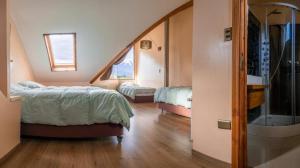 Cabanas Martina Bungalows 3 con vista a volcanes l Frente al Lago Llanquihue l Piscina temperada y tinaja TV y WiFi l Hasta 6 personas