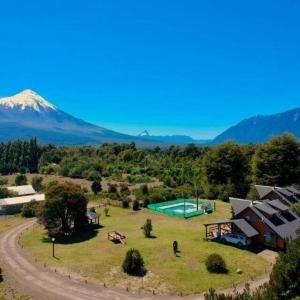 Cabanas Martina Bungalows 3 con vista a volcanes l Frente al Lago Llanquihue l Piscina temperada y tinaja TV y WiFi l Hasta 6 personas