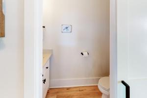 Delightful Coastal Home with WiFi Furnished Porch & Shared Pool-Dog Friendly