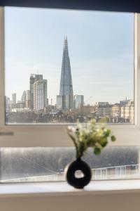 High-Floor 2BR wShard Skyline Views | TowerBridge