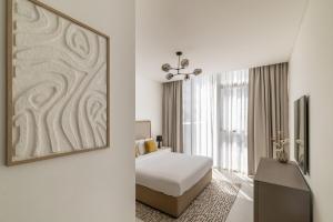 Stylish 3 Bedroom in District One with Balcony and Parking