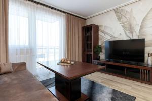 Przytulny Apartament z Balkonem i Parkingiem by Noclegi Renters