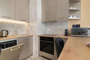Gdańsk Letnica Przytulny Apartament z Balkonem i Parkingiem by Noclegi Renters