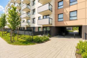 Gdańsk Letnica Przytulny Apartament z Balkonem i Parkingiem by Noclegi Renters