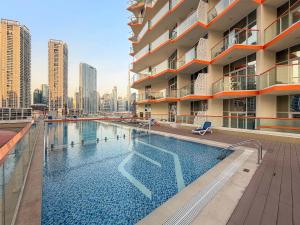 FIRST CLASS 1BR Canal & Burj Khalifa View