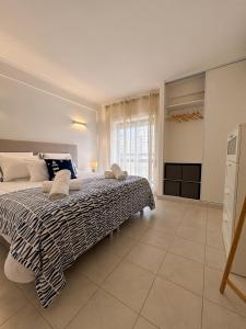 BnB Homes vibrant Ocean View terraced apartment with swimming pool 200 m to the beach