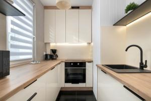 Przytulny Apartament Blisko Parku Reagana w Gdańsku by Noclegi Renters