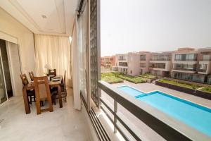 Cozy 2-Bedroom Apartment with Pool & Balcony in Marrakech