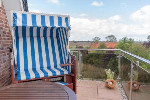 Inselblume 61 - Ferienwohnung mit Balkon in Neue Tiefe