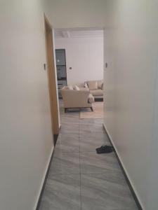 modern serenity suites apartments with swimming pool,modern equipped gym,private parking space, children playing ground, proximity to major shopping malls and unbeatable city views