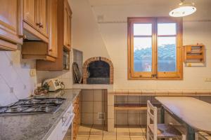 Alojamiento con chimenea en Sant Jaume de Llierca