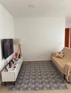 Apartamento em Buraquinho 5 min a pé da praia